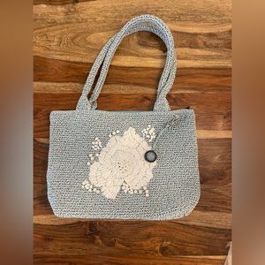 The Sak crochet beautiful handbag in excellent/new condition.